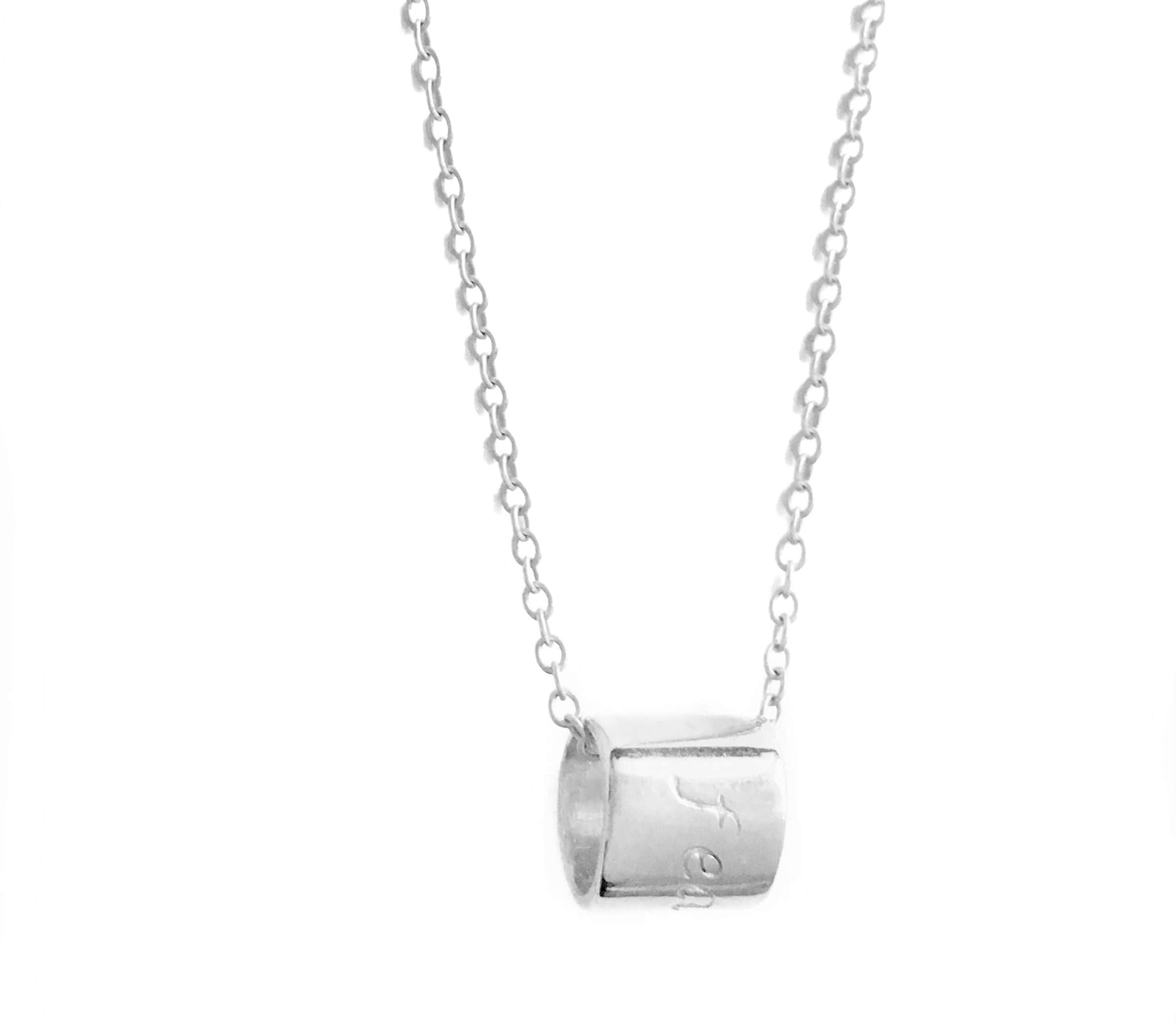 Sterling silver cylinder pendant necklace stamped with fearless
